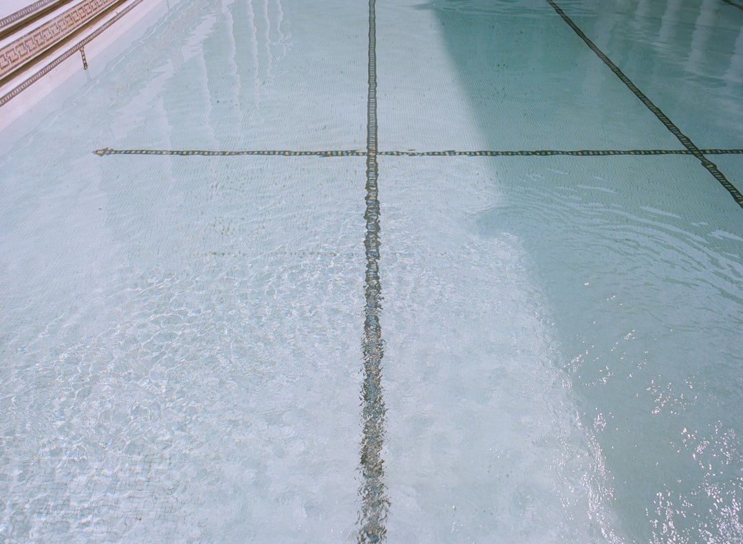 Professional grade pool cover with safety features